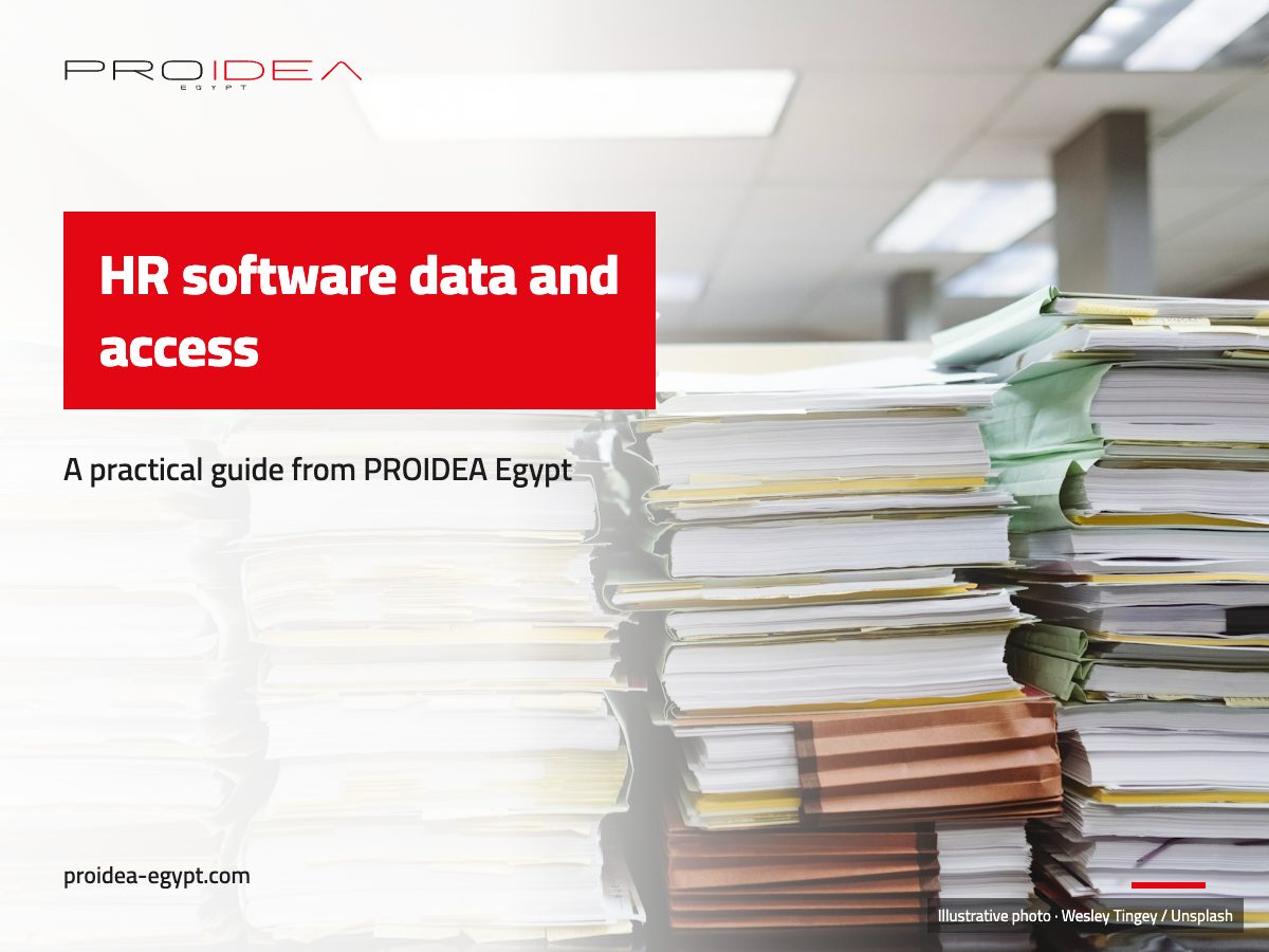 Illustration for “HR software data and access”: Stacks of paper files and folders in an office
