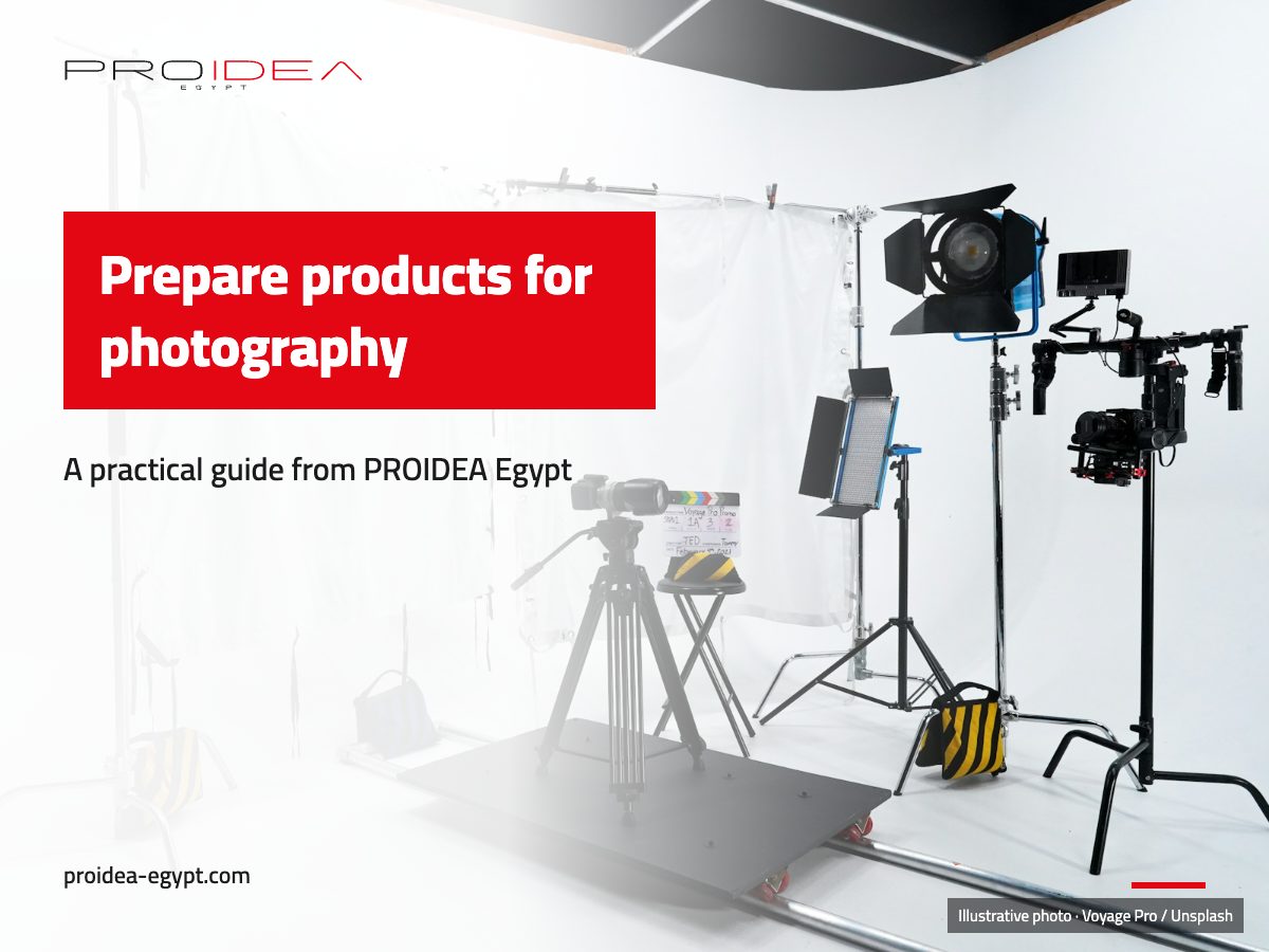 Illustration for “Prepare products for photography”: A white photo studio with a camera on a tripod and lights